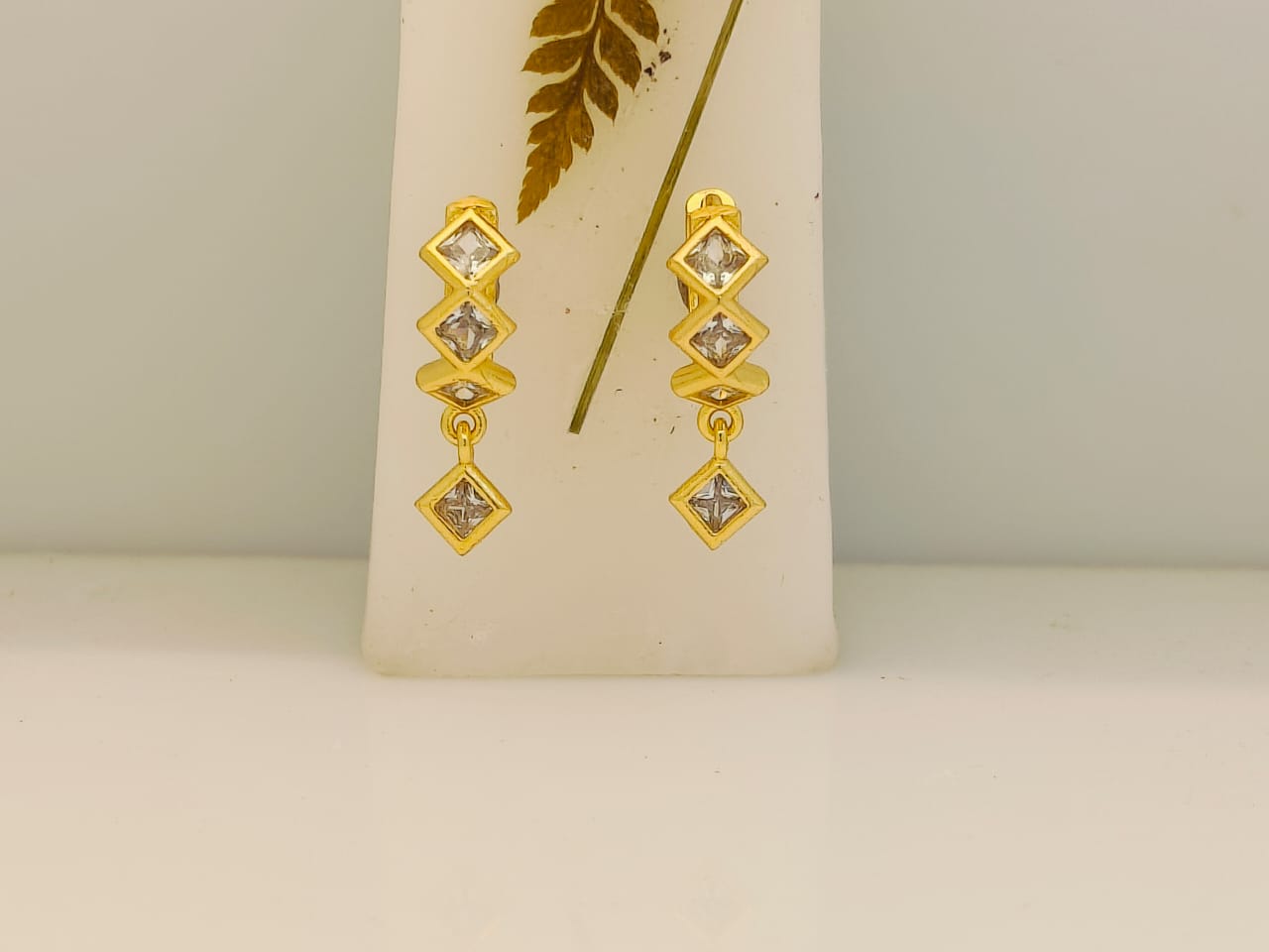 Dazzling Diamond-Cut Gold Huggie Earrings